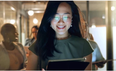 woman looking at a tab