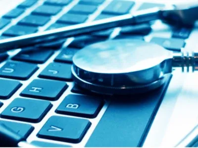 Closeup view of a stethoscope on a keyboard