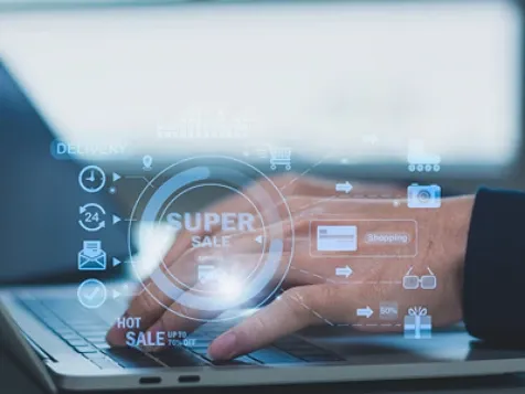 A set of hands on laptop keyboard with see through computerized screen as an overlay.