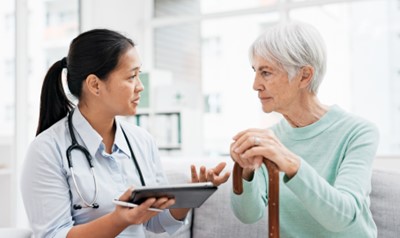 Doctor helping patient