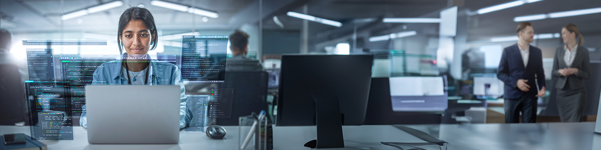 A graduate working out of a large office