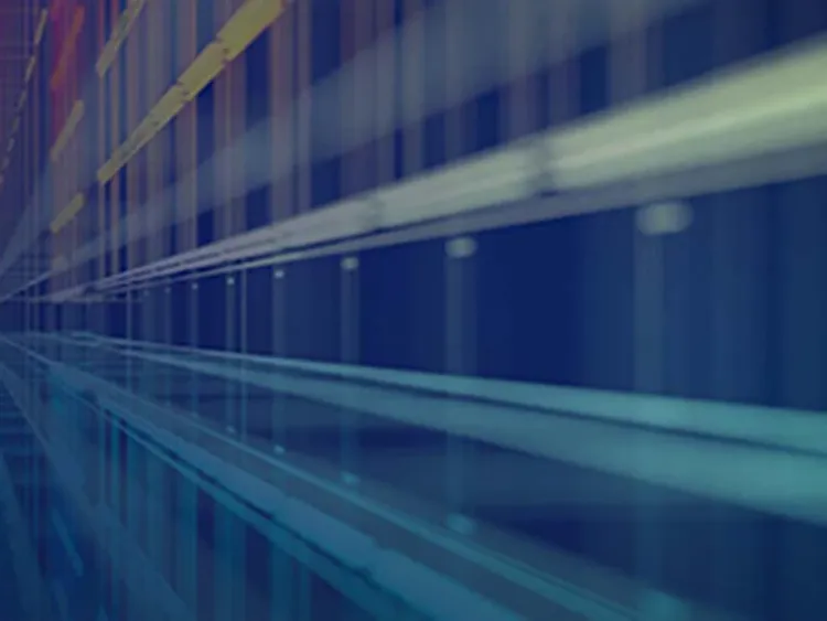 A long hallway illuminated by various colored lights, creating a vibrant and dynamic atmosphere.