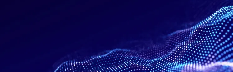 Abstract image of a flowing blue wave of light against a dark background, creating a serene and dynamic visual effect