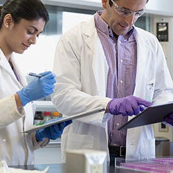 Lab scienists discussing