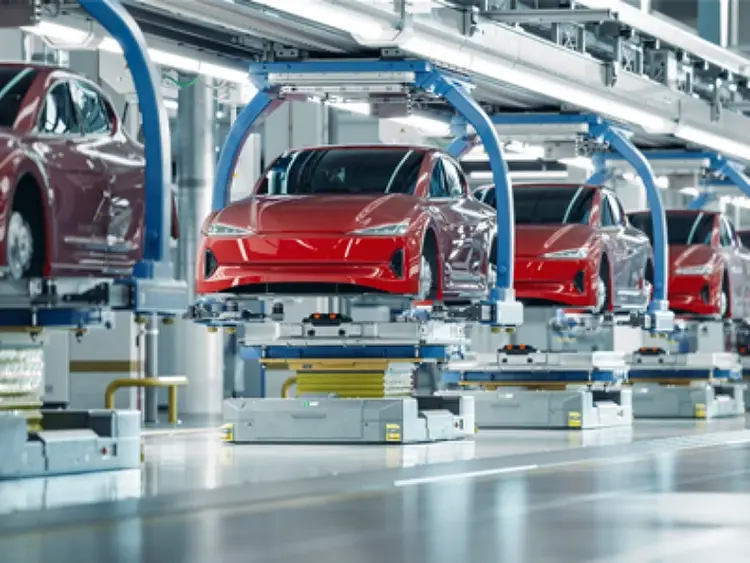 An assembly line of automobiles.