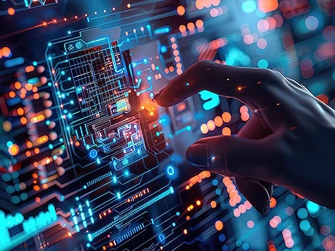 A hand touching a light up computerized databoard.