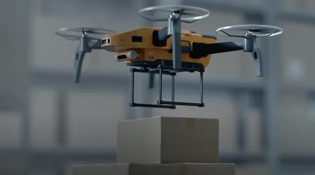 A drone carrying a package for delivery.