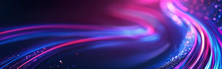 Neon pink, purple and blue light trails flowing across a dark background.