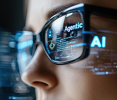 A close-up shot of a glasses worn by a woman that reflects the word agentic