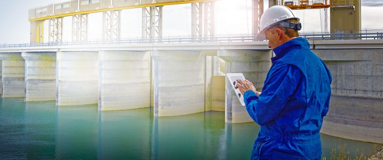 engineer checking dam