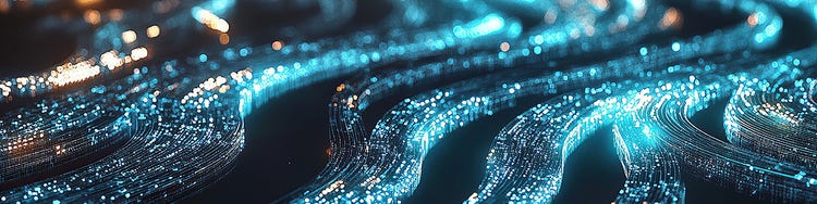 Abstract image of blue light waves flowing in motion, creating a dynamic and fluid visual effect.