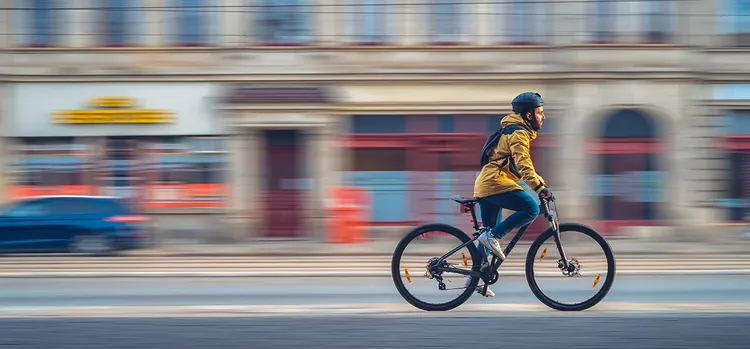 Image of a person riding a cycle