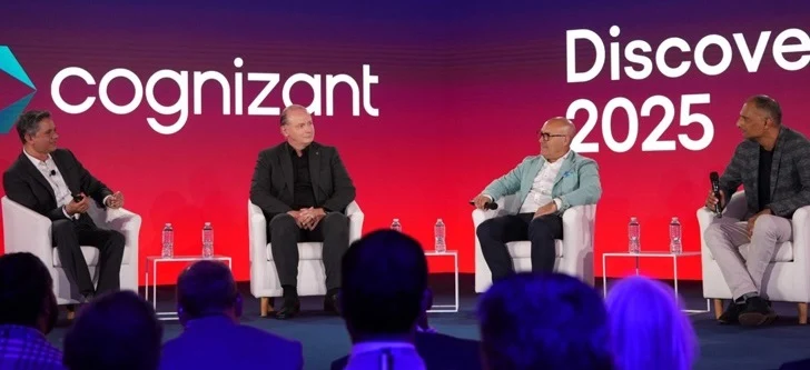 panelists sitting on a stage at the World Economic Forum event