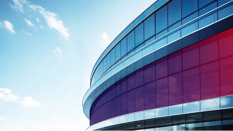 A vibrant red ribbon on building top