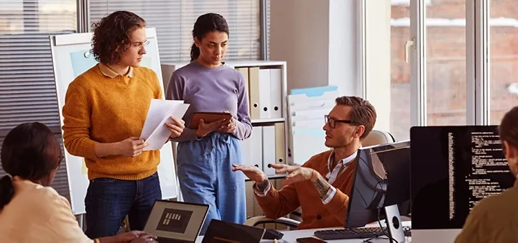 A group of software developers in a meeting