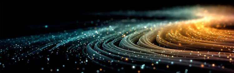 Abstract image of circular lines in multiple colors against a black background like the solar system