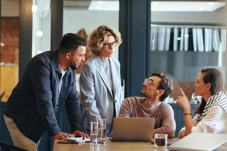 employees interacting over technology