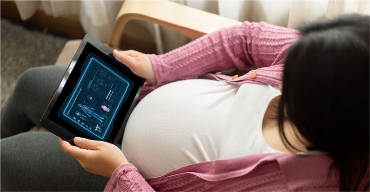 A woman in a lab coat is focused on her cell phone.