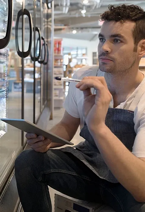Man noting down important points