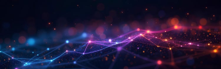 Abstract image of colorful star studded lights connected together against a dark background